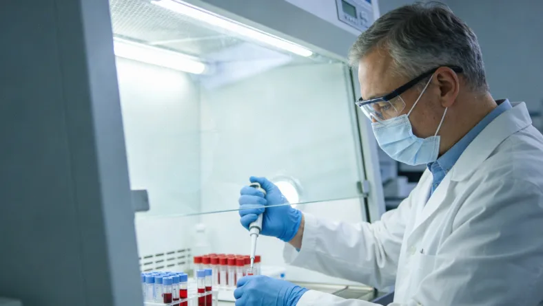 基因检测报告局部特写,突出显示“检测范围”说明文字